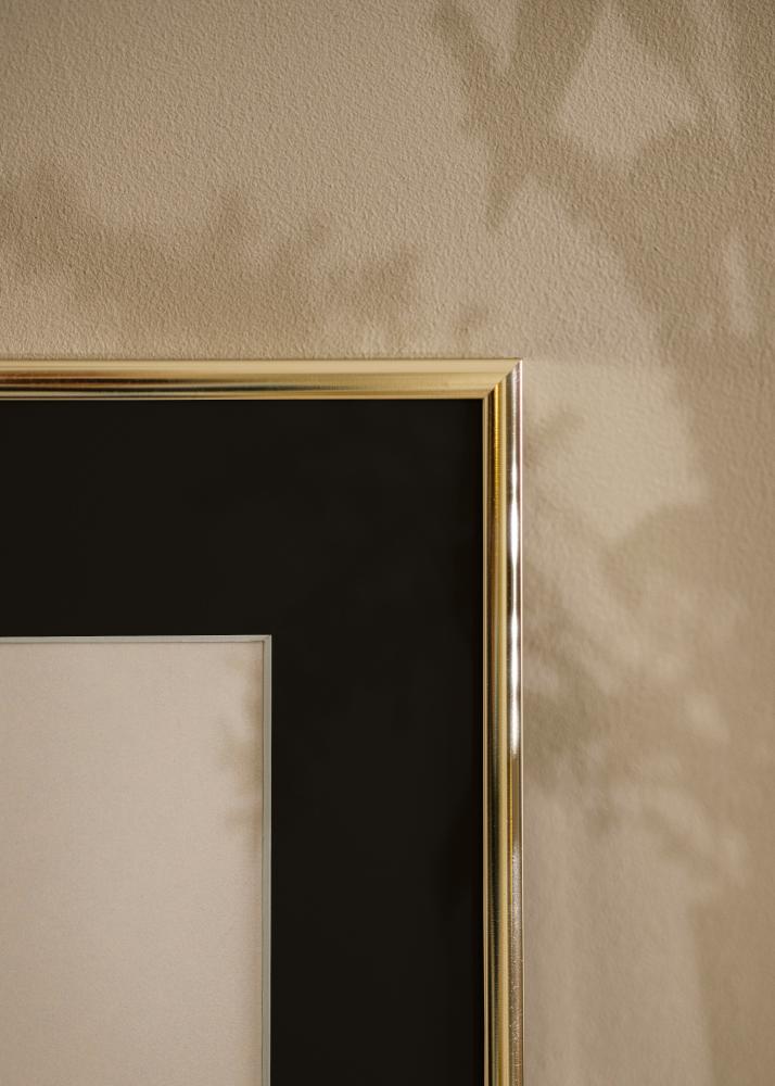 Cornice Alluminio Finitura brillante Oro 70x100 cm - Passe-partout Nero 62x85 cm